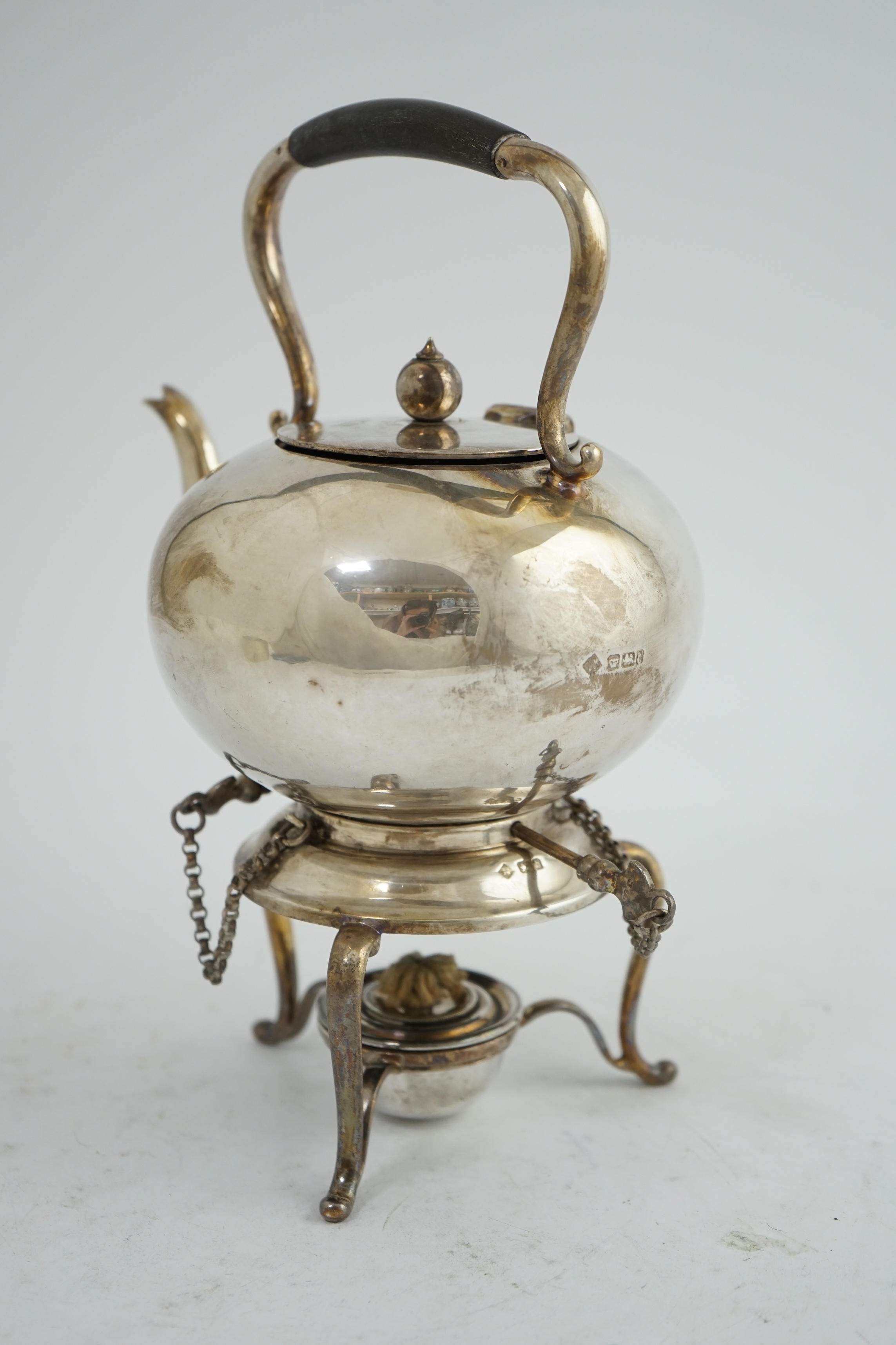 A late Victorian silver bachelor's tea kettle on stand with burner, by Martin, Hall & Co